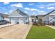 Charming home featuring a two-car garage and well-manicured lawn at 801 San Marco Ct. # C, Myrtle Beach, SC 29579