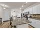 Spacious kitchen featuring white cabinets, granite counters, and stainless steel appliances at 801 San Marco Ct. # C, Myrtle Beach, SC 29579