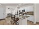 Well-lit kitchen with granite countertops, stainless appliances, and a cozy breakfast nook at 801 San Marco Ct. # C, Myrtle Beach, SC 29579