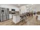 Open kitchen featuring granite countertops, stainless steel appliances, and a breakfast bar at 801 San Marco Ct. # C, Myrtle Beach, SC 29579