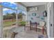 Relaxing screened porch with seating, decor, and a view of the outdoors at 801 San Marco Ct. # C, Myrtle Beach, SC 29579