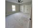 A bedroom featuring a ceiling fan, window, and closet at 8012 Old Reaves Ferry Rd., Conway, SC 29526