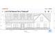 Detailed front elevation of a two-story home design, highlighting windows and stone veneer details at 8012 Old Reaves Ferry Rd., Conway, SC 29526