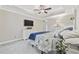 Bright main bedroom features a ceiling fan, TV, and a large dresser at 805 Sunswept Ct. # 102, Murrells Inlet, SC 29576