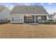 Backyard with patio and outdoor dining area at 834 Summer Starling Pl., Myrtle Beach, SC 29577