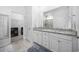 Bright bathroom with double sinks, granite counters, and a walk-in shower at 834 Summer Starling Pl., Myrtle Beach, SC 29577