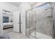 The bathroom features a large shower with glass doors and tile surround at 834 Summer Starling Pl., Myrtle Beach, SC 29577