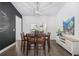 Dining room with a chandelier, dark wood table, and light walls at 834 Summer Starling Pl., Myrtle Beach, SC 29577