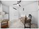 Home office featuring neutral decor, natural light, and a rustic desk with black rolling chair at 834 Summer Starling Pl., Myrtle Beach, SC 29577