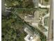 Aerial view of the property showcasing its large lot, waterfront location, and beautiful landscaping at 994 Debordieu Blvd., Georgetown, SC 29440