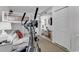 Bedroom with a bunk bed and an elliptical machine, creating a unique and functional space at 994 Debordieu Blvd., Georgetown, SC 29440