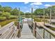 Private dock featuring a walkway and boat mooring, surrounded by waterway views at 994 Debordieu Blvd., Georgetown, SC 29440
