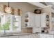 Kitchen detail showcasing cabinets, a window with natural light, and stylish decor at 994 Debordieu Blvd., Georgetown, SC 29440