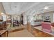 An open-concept living area with hardwood floors seamlessly connecting to dining and kitchen at 994 Debordieu Blvd., Georgetown, SC 29440
