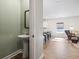 Powder room featuring a pedestal sink and view into the open concept living area at 1047 Harbison Circle, Myrtle Beach, SC 29579