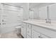 Bathroom featuring a neutral vanity with a sink, a toilet, and a shower-tub combo at 1047 Harbison Circle, Myrtle Beach, SC 29579