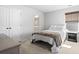 Bedroom with neutral walls and carpet, a cozy bed, and ample natural light at 1047 Harbison Circle, Myrtle Beach, SC 29579