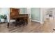 A dining room offers wood floors and a traditional wood table and chairs at 1047 Harbison Circle, Myrtle Beach, SC 29579