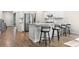Open concept kitchen with granite countertops, stainless steel appliances, and barstool seating at 1047 Harbison Circle, Myrtle Beach, SC 29579