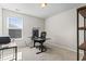 Well-lit office space with neutral walls and carpet, window, and modern furnishings at 1047 Harbison Circle, Myrtle Beach, SC 29579