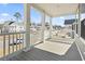 Covered porch offering views of the neighborhood at 1047 Harbison Circle, Myrtle Beach, SC 29579