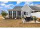 The backyard has a screened patio with exterior patio at 1069 Williston Loop # 1069, Murrells Inlet, SC 29576