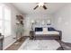 Charming bedroom features a ceiling fan, daybed, decor, and natural light from the bright shuttered windows at 1069 Williston Loop # 1069, Murrells Inlet, SC 29576