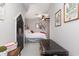 Bedroom with chalkboard door, a ceiling fan, and exposed bed with rustic decor at 1069 Williston Loop # 1069, Murrells Inlet, SC 29576