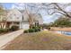 Charming two-story home with an attached garage and a well-manicured lawn with privacy bushes at 1069 Williston Loop # 1069, Murrells Inlet, SC 29576