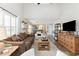 Spacious living area leading to dining space, featuring hardwood floors and neutral wall colors at 1069 Williston Loop # 1069, Murrells Inlet, SC 29576
