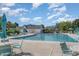 Beautiful community pool featuring inviting blue waters and plenty of lounge chairs for relaxation at 1069 Williston Loop # 1069, Murrells Inlet, SC 29576