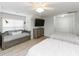 Large bedroom featuring a daybed and 2 full size beds and a tv at 114-B 7Th Ave. N, Surfside Beach, SC 29575