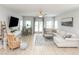 Spacious living area featuring modern decor, comfortable seating, and a flat screen TV at 114-B 7Th Ave. N, Surfside Beach, SC 29575