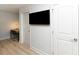Media room with hardwood flooring and TV at 114-B 7Th Ave. N, Surfside Beach, SC 29575