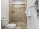 The bathroom has a glass enclosed shower with tile surround at 1361 Midtown Village Dr., Conway, SC 29526