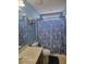 Bright bathroom featuring blue walls and a large mirror above the vanity at 153 Highmeadow Ln., Aynor, SC 29511