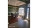 Formal dining room with hardwood floors, elegant decor, and a large window at 153 Highmeadow Ln., Aynor, SC 29511