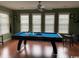 Spacious game room with a billiard table and plenty of natural light at 153 Highmeadow Ln., Aynor, SC 29511