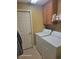 Convenient laundry room with modern washer and dryer, storage cabinets, and a practical layout at 153 Highmeadow Ln., Aynor, SC 29511