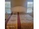 Comfortable main bedroom with neutral tones and a decorative headboard at 153 Highmeadow Ln., Aynor, SC 29511