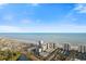 Wonderful aerial view showcases the coastline, beach, and surrounding landscape at 161 Seawatch Dr. # 1101, Myrtle Beach, SC 29572