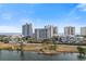 Aerial view of the multi-story community and lakefront, showcasing building and amenities at 161 Seawatch Dr. # 1101, Myrtle Beach, SC 29572