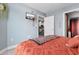 Inviting bedroom with neutral tones, a bed with a decorative blanket, and an ensuite bathroom at 161 Seawatch Dr. # 1101, Myrtle Beach, SC 29572