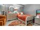 Charming bedroom with a decorative dresser, bed with patterned linens, and stylish decor at 161 Seawatch Dr. # 1101, Myrtle Beach, SC 29572