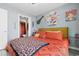 Comfortable bedroom with colorful decor, a plush bed, and an ensuite bathroom at 161 Seawatch Dr. # 1101, Myrtle Beach, SC 29572
