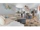 An open floor plan with a living space connecting to a dining area and kitchen with decor throughout at 161 Seawatch Dr. # 1101, Myrtle Beach, SC 29572