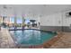Beautiful indoor pool with seating and access to the beach at 161 Seawatch Dr. # 1101, Myrtle Beach, SC 29572