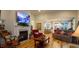 Inviting living room with fireplace, hardwood floors, and an open layout flowing into the kitchen at 1883 Suncrest Dr., Myrtle Beach, SC 29577