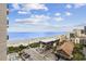 Expansive beach view from above showcasing the building amenities and beautiful ocean waters at 200 76Th Ave. N # 510, Myrtle Beach, SC 29572