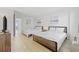 Bright bedroom featuring two beds with white linens and beachy artwork at 200 76Th Ave. N # 510, Myrtle Beach, SC 29572
